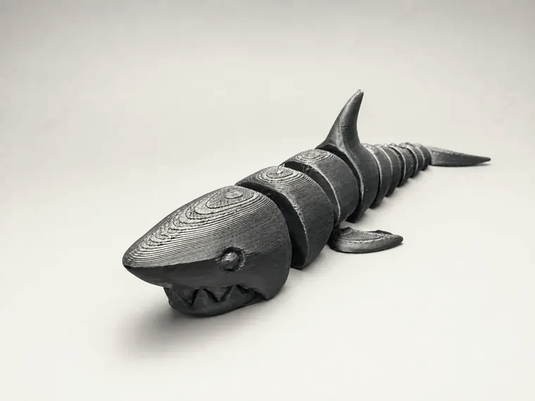 Articulated shark print in a studio product photo