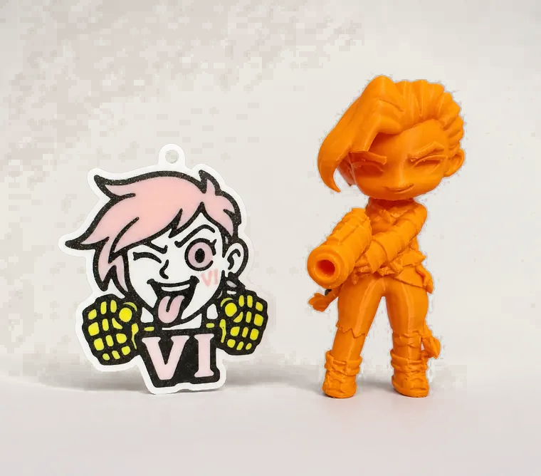 Pink mascot and orange figure pair