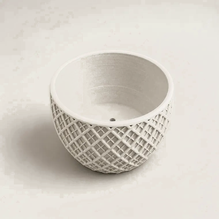 White lattice planter bowl photographed in the studio
