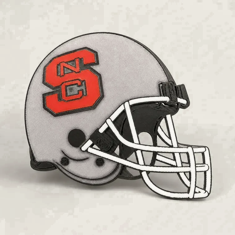 Layered NC State football helmet sign