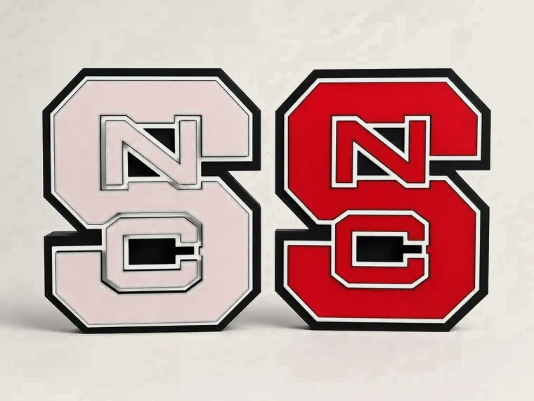 Paired red and white NC State emblems